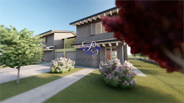 Esclusiva e nuova villa di testa con ampi spazi e giardino su tre lati